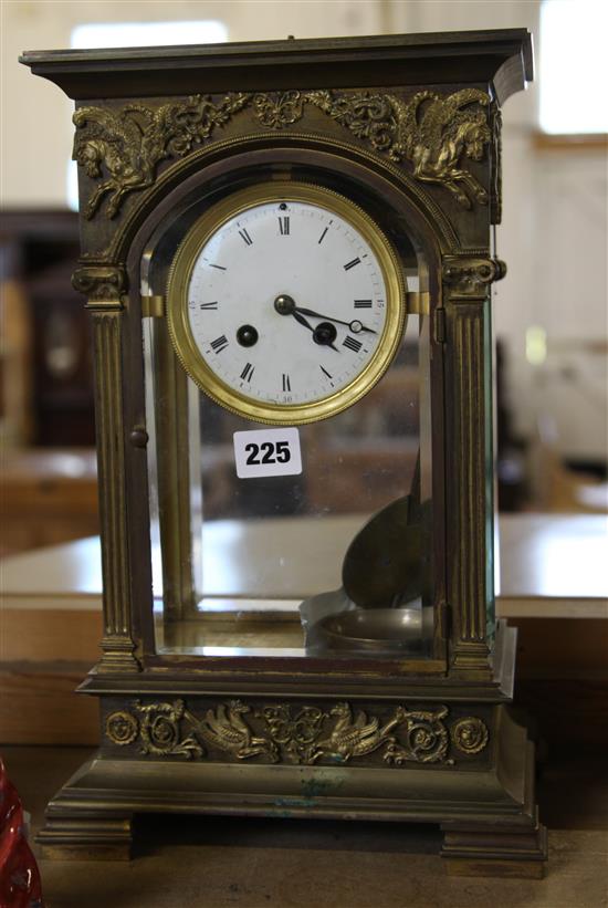 Late 19th century French gilt brass four glass mantel clock, with griffin motifs (lacking surmount)
